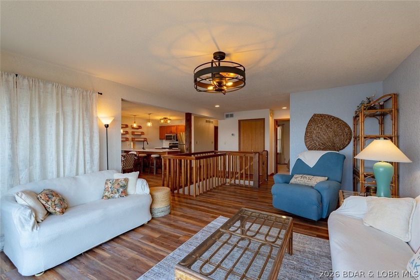 Experience lake life at its finest in this stunning two-level, 1 - photo 4