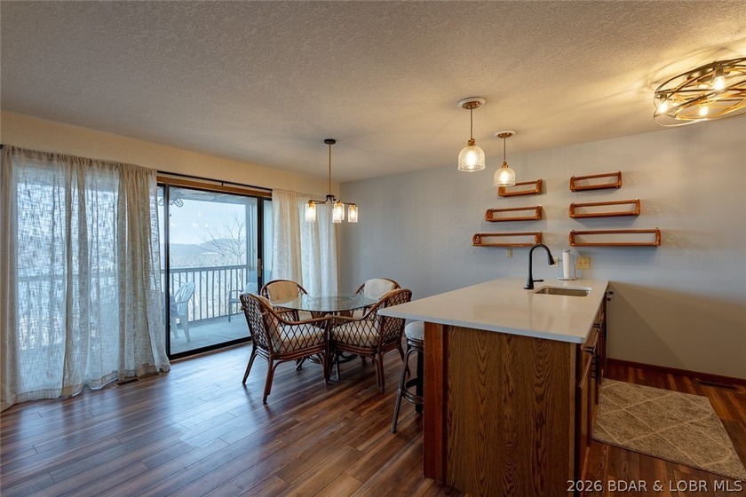 Experience lake life at its finest in this stunning two-level, 1 - photo 6