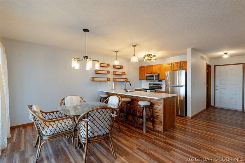 Experience lake life at its finest in this stunning two-level, 1 - photo 7