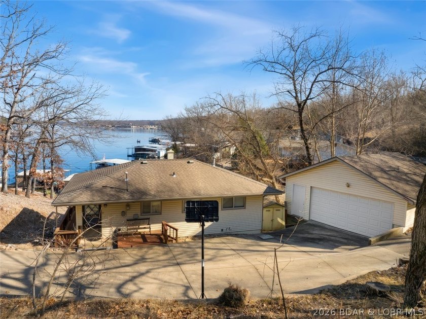 Updated Lake Front Home with Cove protection and Main Channel - photo 3