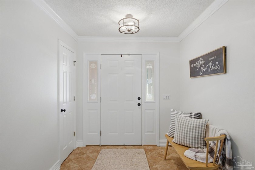 PRICE IMPROVEMENT* Discover an open and inviting floor plan in - photo 3