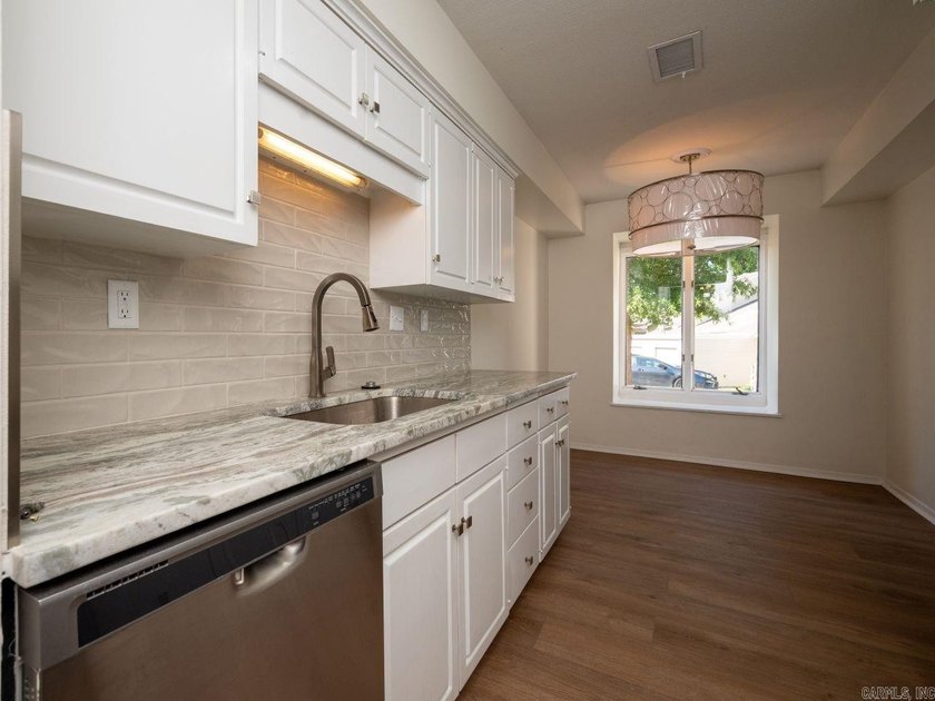 Enjoy refined, low-maintenance living in this fully renovated - photo 15