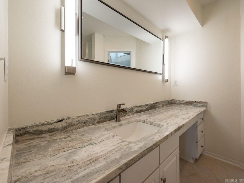 Enjoy refined, low-maintenance living in this fully renovated - photo 24