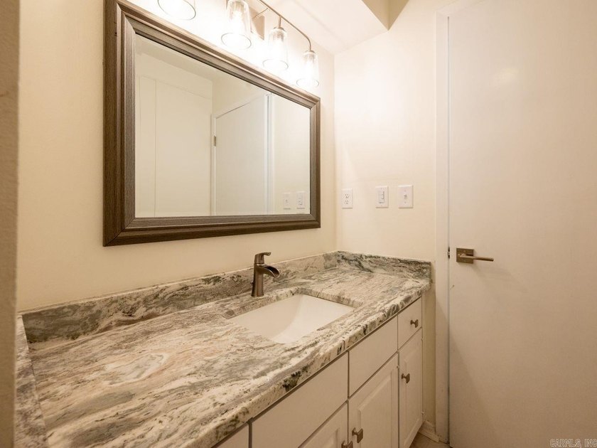 Enjoy refined, low-maintenance living in this fully renovated - photo 34