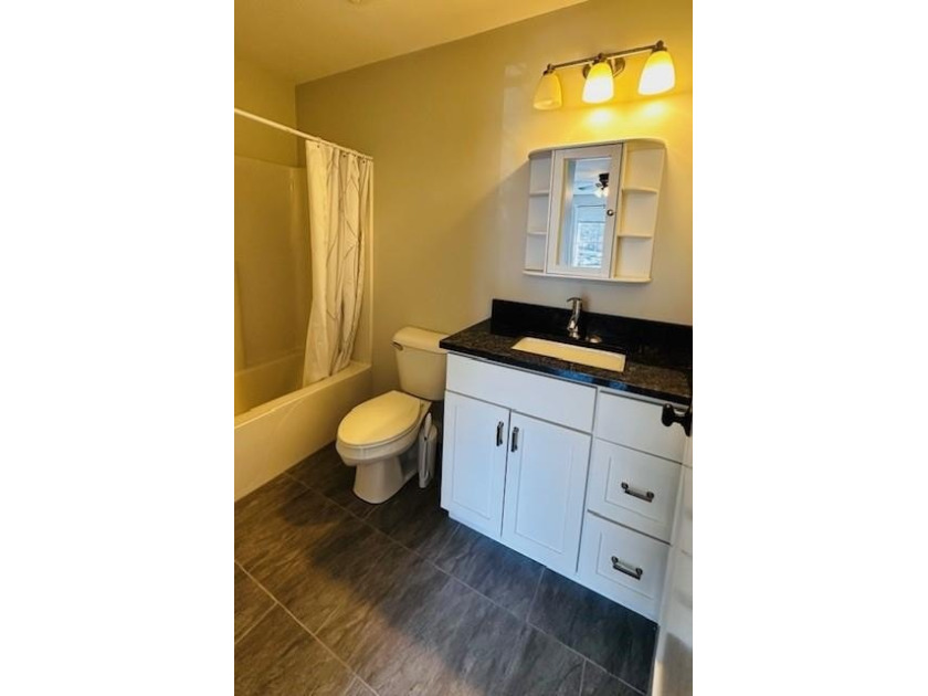 Welcome home to Waterside Condominiums! Conveniently located and - photo 16