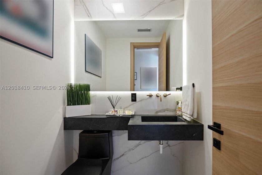 Step into this meticulously renovated residence in the Western - photo 34