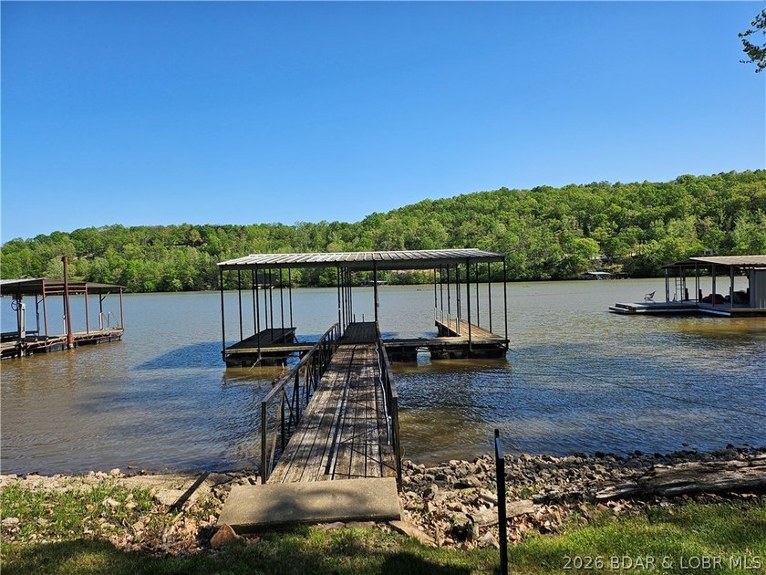 This lakefront homes has many pluses: one level living, attached - photo 4