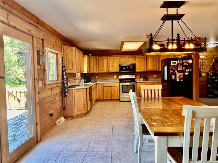 Your Northwoods dream home awaits! Nestled on 14.68 acres, this - photo 11