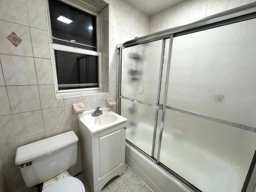 Welcome to this detached 2-family home located in the heart of - photo 11