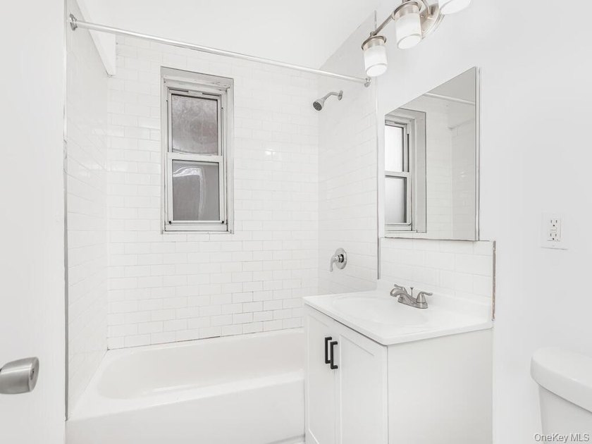Welcome to this sun-filled, spacious one-bedroom corner co-op in - photo 9