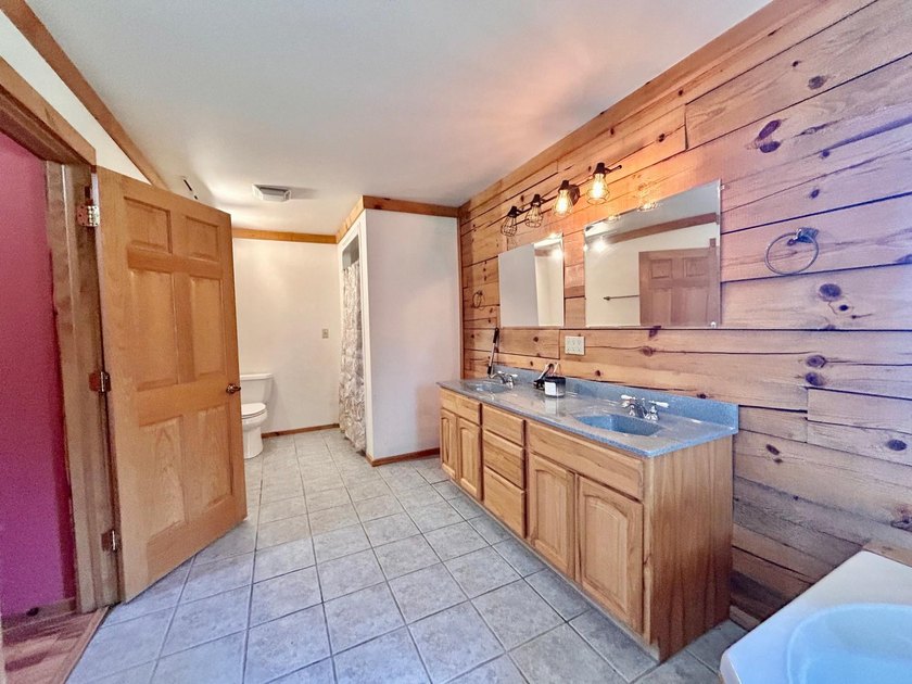Your Northwoods dream home awaits! Nestled on 14.68 acres, this - photo 20