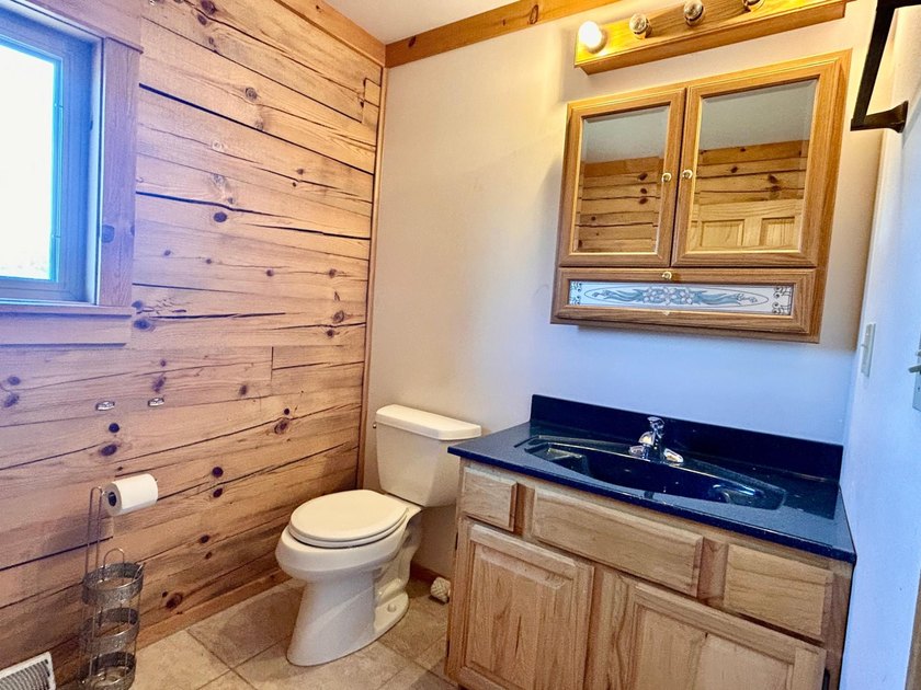Your Northwoods dream home awaits! Nestled on 14.68 acres, this - photo 21