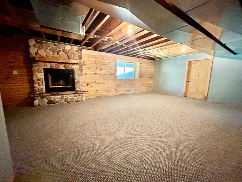 Your Northwoods dream home awaits! Nestled on 14.68 acres, this - photo 23