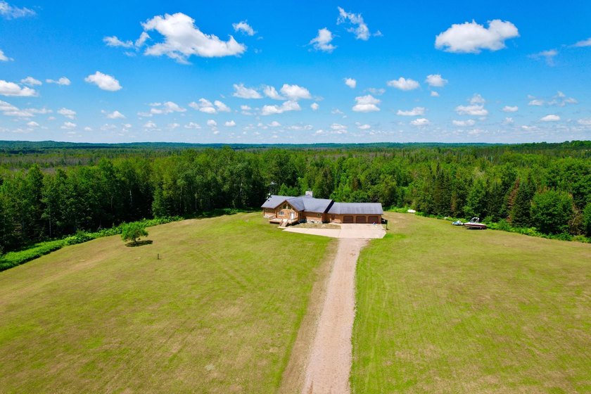 Your Northwoods dream home awaits! Nestled on 14.68 acres, this - photo 30