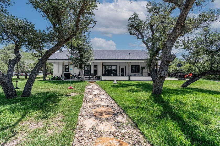 Charming Coastal Farmhouse on 1/2 Acre with Pond in Coveted - photo 22
