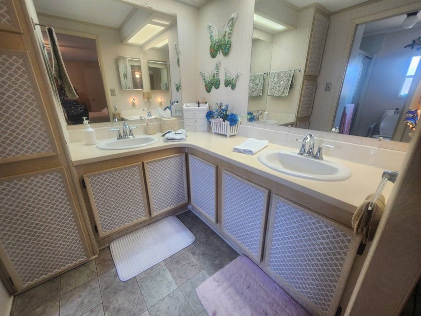 Welcome to this charming manufactured double-wide in the very - photo 22