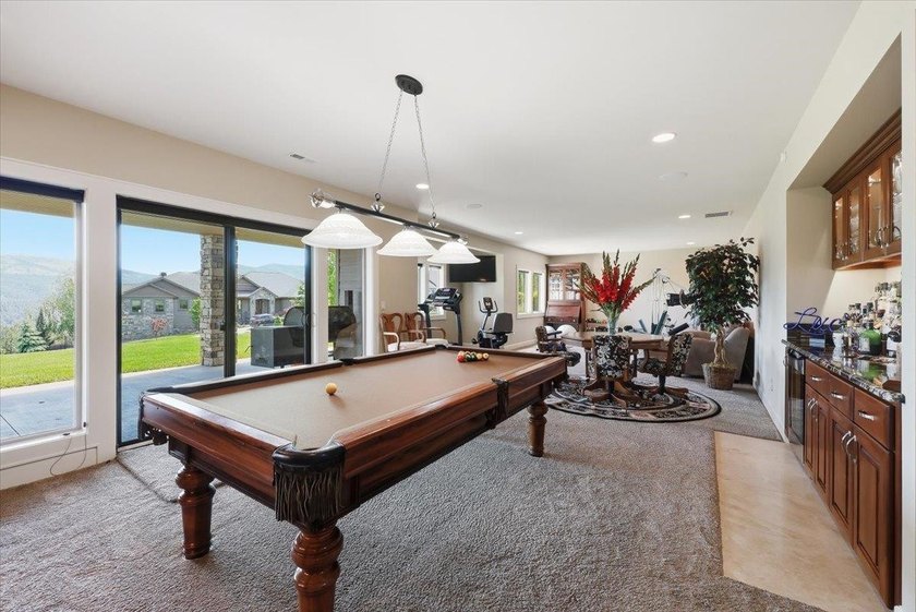 UNLIMITED VIEWS! $100K DROP! Custom-built home offers the BEST - photo 30