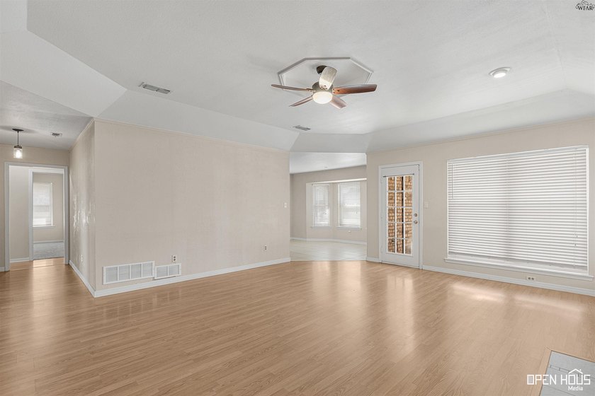 Welcome to this charming 3-bedroom, 2-bath home in the highly - photo 8