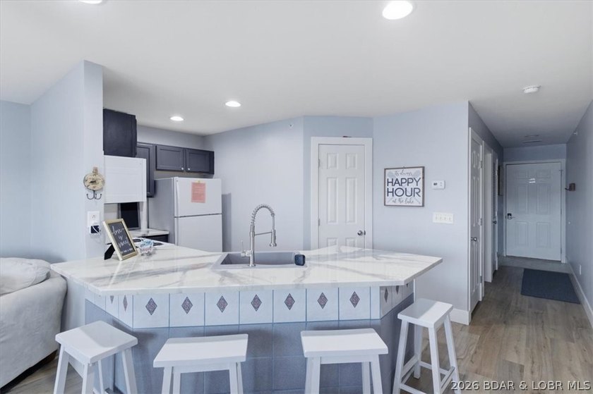 This 1-Bed, 1-Bath, condo spans 589 Sq Ft and is perfectly - photo 2