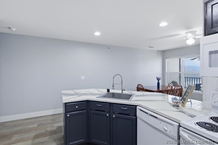 This 1-Bed, 1-Bath, condo spans 589 Sq Ft and is perfectly - photo 4