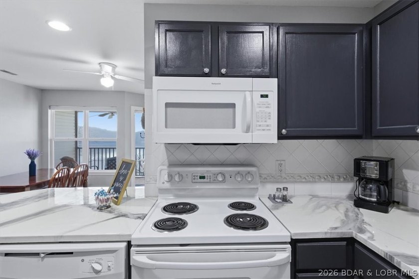 This 1-Bed, 1-Bath, condo spans 589 Sq Ft and is perfectly - photo 5