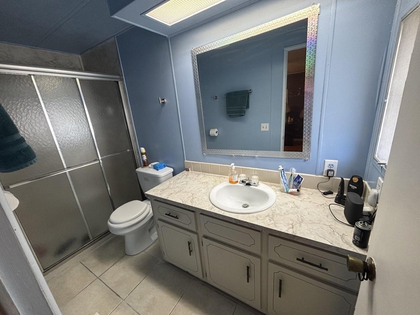 WELL MAINTAINED WITH 2 BEDROOMS, 2 BATHS AND A FLORIDA ROOM WITH - photo 18