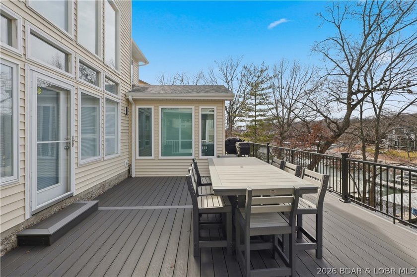 This 5-bedroom, 3.5-bath lakefront home in Four Seasons is - photo 4