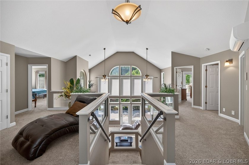 This 5-bedroom, 3.5-bath lakefront home in Four Seasons is - photo 5