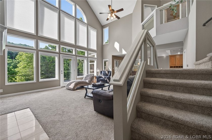 This 5-bedroom, 3.5-bath lakefront home in Four Seasons is - photo 10