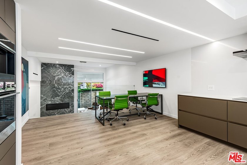 This extensively renovated front-facing multi-story townhome - photo 14