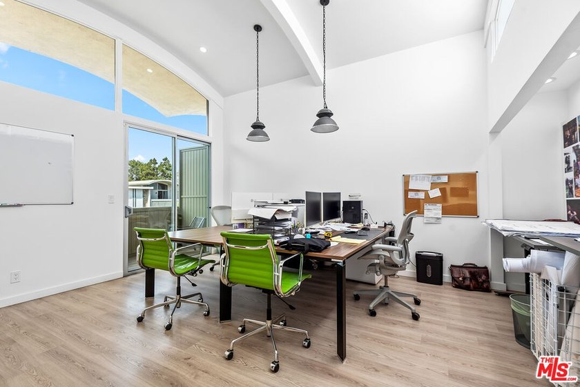 This extensively renovated front-facing multi-story townhome - photo 18