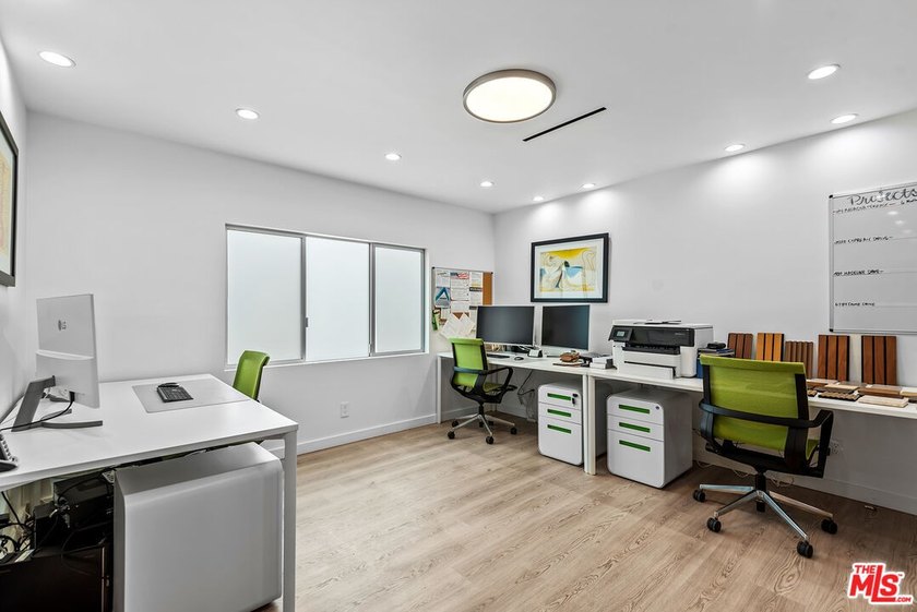 This extensively renovated front-facing multi-story townhome - photo 24