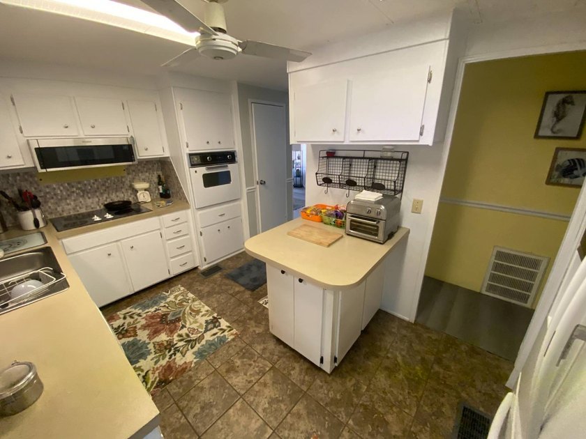 **Located in an active, resort style, pet friendly, land leased - photo 6