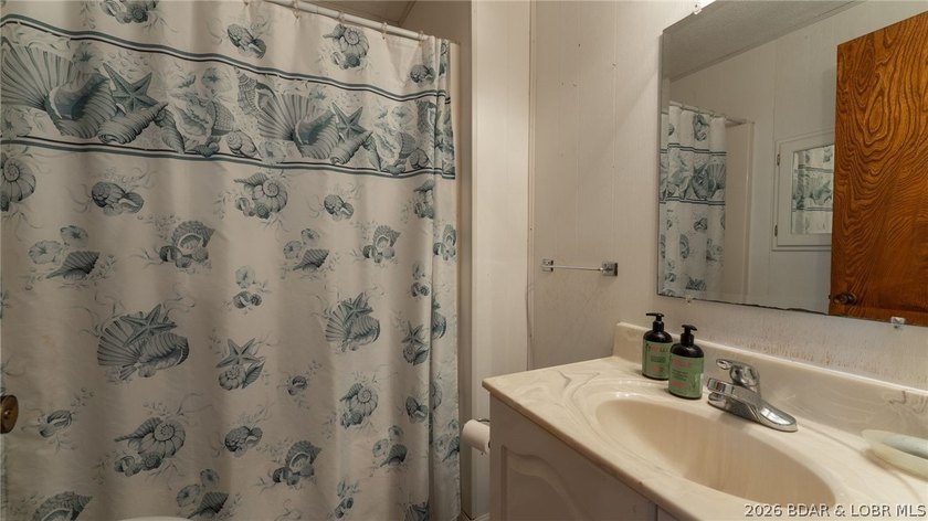 Wonderful lake view from this Gravois home. Original owner is - photo 16