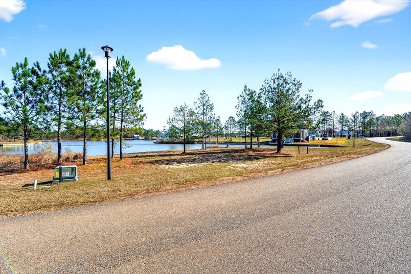 Beautiful waterfront lot in Big Bay Lake subdivsion, offering - photo 3