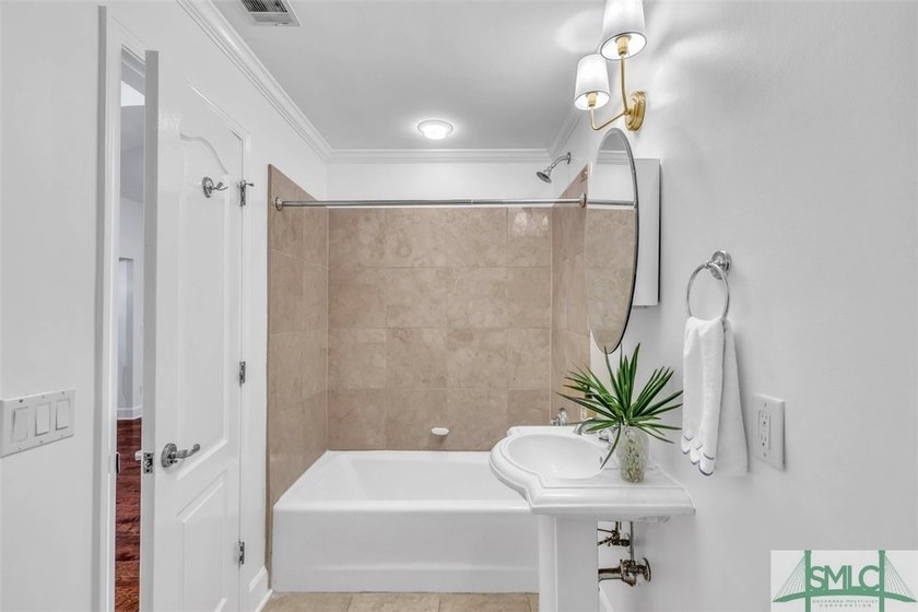 This first-floor residence offers convenient dual entrances - - photo 22