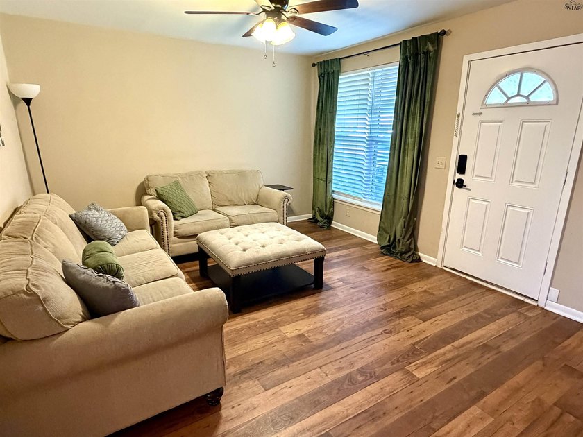 Step inside this 3-bedroom, 1.5-bath home offering comfortable - photo 5