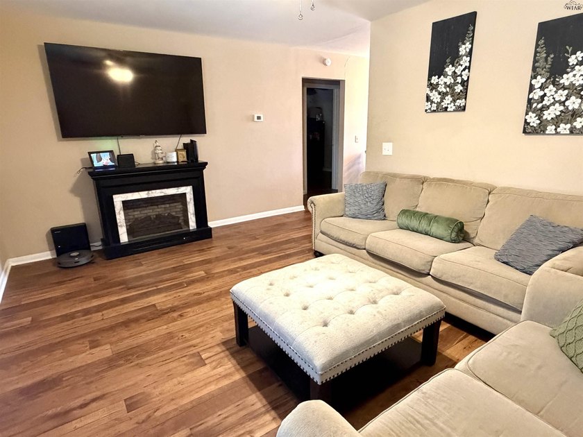 Step inside this 3-bedroom, 1.5-bath home offering comfortable - photo 6