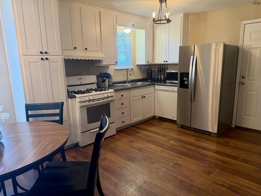 Step inside this 3-bedroom, 1.5-bath home offering comfortable - photo 8