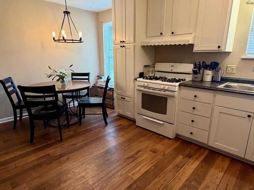 Step inside this 3-bedroom, 1.5-bath home offering comfortable - photo 9