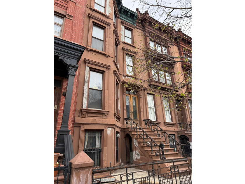 This classic four-story brownstone with beautiful architectural - photo 3