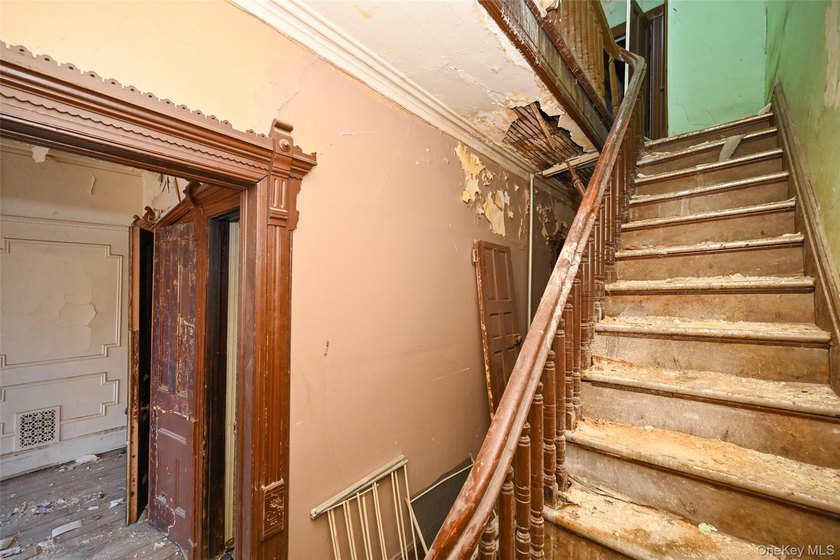 This classic four-story brownstone with beautiful architectural - photo 10