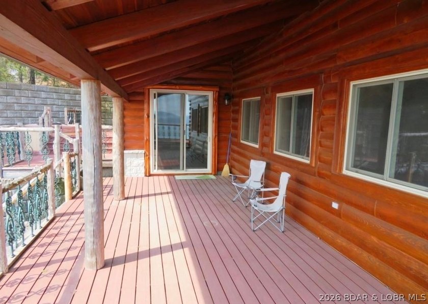 A VIEW FOR MILES! This one-of-a-kind custom log home showcases - photo 4