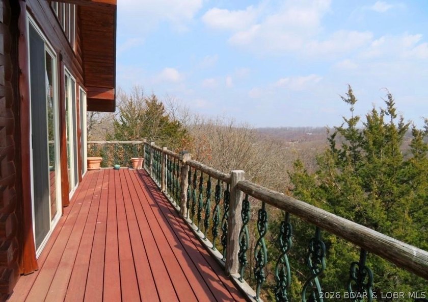 A VIEW FOR MILES! This one-of-a-kind custom log home showcases - photo 5