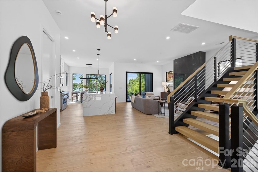 Experience refined lakefront living in this stunning new - photo 2