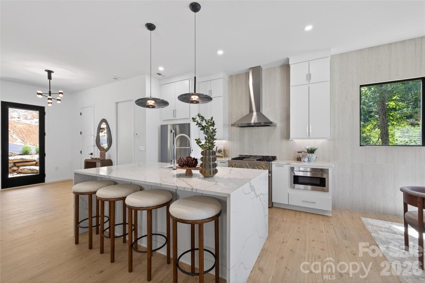Experience refined lakefront living in this stunning new - photo 4