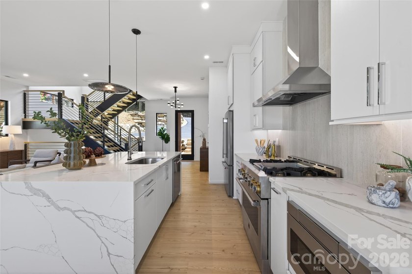 Experience refined lakefront living in this stunning new - photo 5