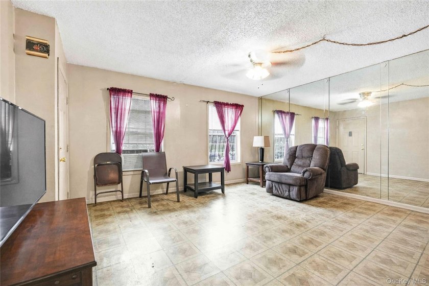 Welcome to 2069 Seward Avenue, a well-maintained two-family home - photo 3
