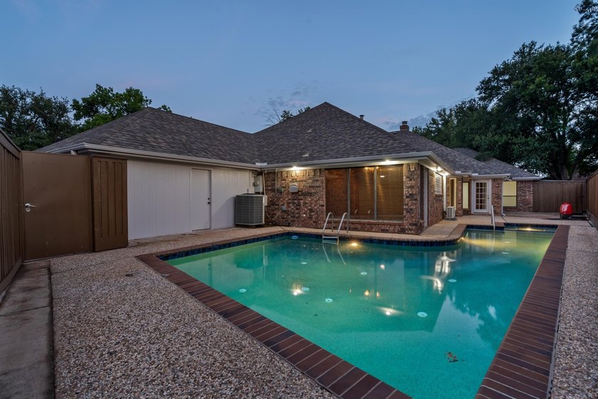 Tucked on a corner lot in Midwestern Park, this 4-bed, 3-bath - photo 5