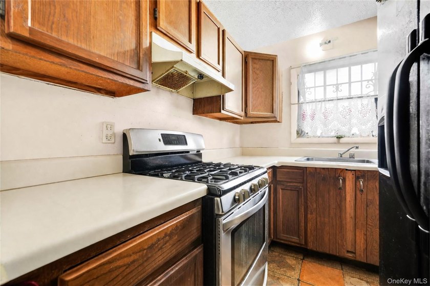 Welcome to 2069 Seward Avenue, a well-maintained two-family home - photo 7